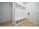 Mudroom with white built-in bench and storage cubbies next to doors, offering organization at 762 Highway 274 Hwy, Clover, SC 29710