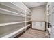 Walk-in pantry with ample shelving, cabinets, and countertop space for storage and organization at 762 Highway 274 Hwy, Clover, SC 29710
