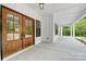 Inviting front porch featuring wood double doors and ample space to relax at 762 Highway 274 Hwy, Clover, SC 29710