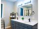 This bathroom features double sinks, modern fixtures, and an enclosed glass shower at 7768 Pinecone Ln, Hickory, NC 28602