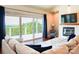 Cozy living room with fireplace, large windows, and comfortable seating at 7768 Pinecone Ln, Hickory, NC 28602