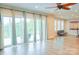 Bright living room featuring sliding glass doors that open to a balcony, offering panoramic views at 7768 Pinecone Ln, Hickory, NC 28602