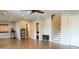 Open living room featuring luxury vinyl plank, white trim, a fireplace, and natural light at 7768 Pinecone Ln, Hickory, NC 28602