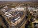 Aerial view of commercial real estate with trees and streets surrounding the buildings at 7908 Rea View Ct, Charlotte, NC 28226