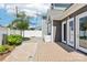 Backyard featuring a stone walkway, green bushes, and neutral colored siding at 7908 Rea View Ct, Charlotte, NC 28226