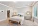 This bedroom features neutral colors, plush carpet, and access to closet at 7908 Rea View Ct, Charlotte, NC 28226