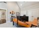 Bedroom with vaulted ceilings featuring two closets and two monitors on a wooden desk at 7908 Rea View Ct, Charlotte, NC 28226