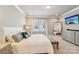 The bedroom features a large mirror and TV for luxurious relaxation at 7908 Rea View Ct, Charlotte, NC 28226