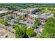 Aerial view of community retail area with convenient parking and close proximity to apartments and lake at 815 Jetton St, Davidson, NC 28036
