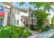 Inviting home featuring a charming exterior, American flag, and well-manicured landscaping at 815 Jetton St, Davidson, NC 28036