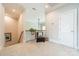 Upstairs hall with comfortable chair, plant and carpet at 815 Jetton St, Davidson, NC 28036