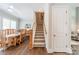 View of dining room, stairs and entry with hardwood flooring at 815 Jetton St, Davidson, NC 28036