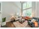 Spacious living room featuring high ceilings and an abundance of natural light at 815 Jetton St, Davidson, NC 28036