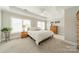 Spacious main bedroom featuring natural light, neutral walls and carpeted floor at 815 Jetton St, Davidson, NC 28036