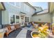 Charming patio with outdoor seating and serene ambiance with a brick accent wall at 815 Jetton St, Davidson, NC 28036
