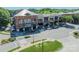 Charming street view of shopping and dining with covered awnings and crosswalk in community at 815 Jetton St, Davidson, NC 28036