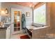 Charming bathroom featuring a clawfoot tub, marble floors, and unique accents at 8532 Piccone Brook Ln, Charlotte, NC 28216