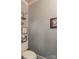 Charming powder room with decorative wallpaper and rustic decor at 8532 Piccone Brook Ln, Charlotte, NC 28216