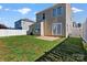 Backyard featuring green grass and patio at 8610 Sawleaf Ct, Charlotte, NC 28215