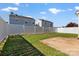 Backyard featuring green grass and patio at 8610 Sawleaf Ct, Charlotte, NC 28215
