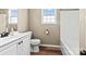 Bathroom featuring a vanity and tub at 8610 Sawleaf Ct, Charlotte, NC 28215