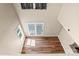 An aerial view of the living room featuring hardwood floors and patio doors at 8610 Sawleaf Ct, Charlotte, NC 28215