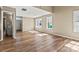 Bright, spacious living room with hardwood floors and ample windows at 8610 Sawleaf Ct, Charlotte, NC 28215