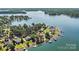 Stunning lakefront home with private dock and lush landscaping at 9561 Island Point Rd, Sherrills Ford, NC 28673