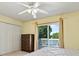 Bright bedroom with double closets and sliding door to deck at 9561 Island Point Rd, Sherrills Ford, NC 28673