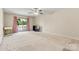 Bright and airy bedroom with sliding glass doors, providing access to a private deck and scenic lake views at 9561 Island Point Rd, Sherrills Ford, NC 28673