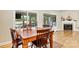 Comfortable dining area with views of the lake, perfect for enjoying meals with Gathering and friends at 9561 Island Point Rd, Sherrills Ford, NC 28673