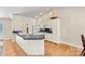 Well-equipped kitchen with white cabinets, stainless steel appliances, and a breakfast bar for casual dining at 9561 Island Point Rd, Sherrills Ford, NC 28673