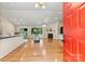 Bright living room with hardwood floors, fireplace, and views of the backyard at 9561 Island Point Rd, Sherrills Ford, NC 28673