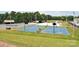 Community basketball courts and recreational area showcasing outdoor activities for residents with sports enthusiasts at 108 Britt Ln, New London, NC 28127