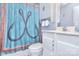 Nautical themed bathroom including a sink, toilet and vanity at 108 Britt Ln, New London, NC 28127