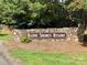 Stone sign marking the entrance to Badin Shores Resort, a community with a welcoming atmosphere at 108 Britt Ln, New London, NC 28127