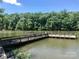 Dock on the lake offering serene views and access to water activities and peaceful relaxation at 108 Britt Ln, New London, NC 28127