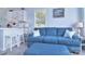 Inviting living area featuring a comfortable couch and a view into the kitchen at 108 Britt Ln, New London, NC 28127