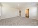 Bedroom featuring soft carpeting, light walls, and windows overlooking the backyard at 111 Canoga Ave, York, SC 29745