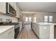 Well-equipped kitchen featuring stainless steel appliances and a view to the patio through the breakfast area at 111 Canoga Ave, York, SC 29745