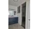 Modern bathroom with sleek vanity, quartz countertop, and a glass-enclosed shower at 1111 Unionville Church Rd, Monroe, NC 28110