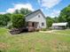 Charming home exterior featuring a cozy front porch and well-maintained landscaping at 1111 Unionville Church Rd, Monroe, NC 28110