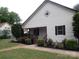 Charming home featuring white siding, manicured landscaping, and a welcoming front porch at 1111 Unionville Church Rd, Monroe, NC 28110