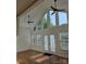 Bright living room with high ceilings, large windows, and new hardwood flooring at 1111 Unionville Church Rd, Monroe, NC 28110