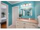 Bright bathroom with granite counters, vanity, and decorative fixtures at 1136 S Edgemont Ave, Gastonia, NC 28054
