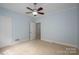 Bedroom with carpet, crown moulding, and a doorway leading to another room at 1136 S Edgemont Ave, Gastonia, NC 28054