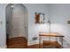 Bright and airy dining area featuring hardwood floors and a charming archway at 1136 S Edgemont Ave, Gastonia, NC 28054