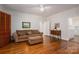 Hardwood floors, ceiling fan, with an opening to another room at 1136 S Edgemont Ave, Gastonia, NC 28054