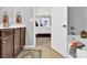 Bathroom featuring modern fixtures, tile flooring, and a view into the main bedroom at 12217 Dearview Ln, Charlotte, NC 28269