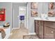 Bathroom featuring a bath, modern fixtures, and decorative touches creating a relaxing space at 12217 Dearview Ln, Charlotte, NC 28269